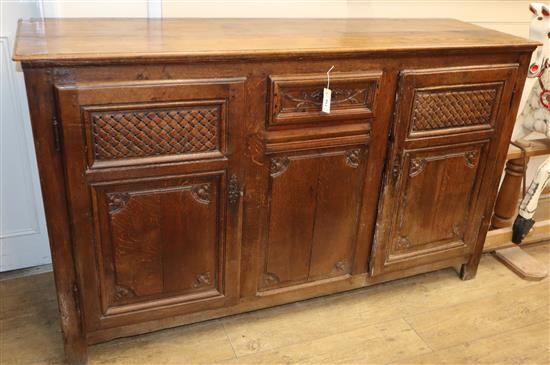A late 18th / early 19th century French carved oak buffet W.170cm